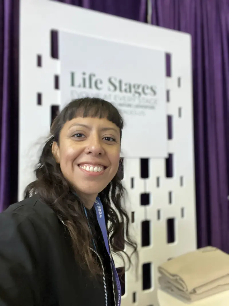 Zulma at the Life Stages booth at the Latinas in Tech Summit