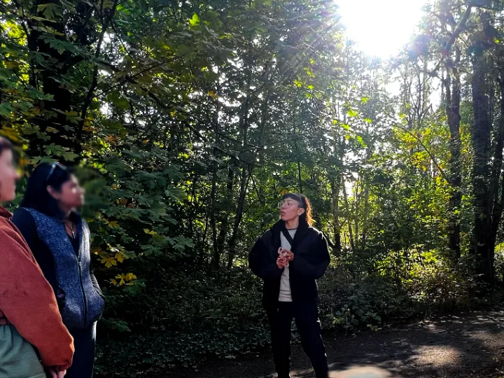 For Individuals & Leaders 2 Zulma coaching outdoors on a forest trail